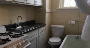 Apartment features all-in-one bathroom and kitchen