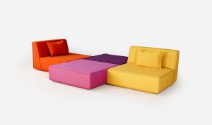 Colorful sofa landscape made from two back modules and two poufs