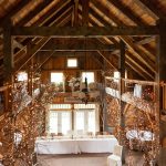 rustic country barn wedding decor with lights
