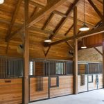 i like the overhead lighting horse barn lighting ideas | Found on  Traveller Location | Horse Barn | Pinterest | Barn stalls, Horse barns  and Barn