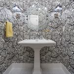 Bold Black and White Floral Wallpaper in Small Bathroom With White Pedestal  Sink