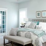 neutral bedroom with soft blue walls
