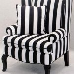 Black-and-white striped Encore wingback chair, $125, available throughout  Southern California from Town & Country Event Rentals.