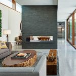 In-wall fireplace set in a contemporary setting