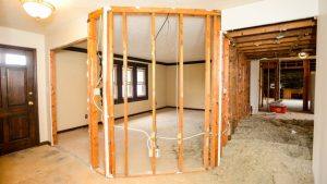 home remodel in process with drywall, studs and wiring exposed