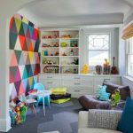 Transitional gender-neutral carpeted playroom photo in Minneapolis with  multicolored walls