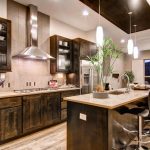 Kitchen With Rustic Wood Cabinetry
