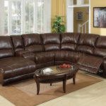 dark brown leather sectional sofa with recliner and coffee table