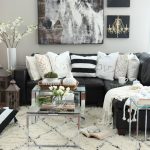 Living room decor ideas. Black, white and creamy neutrals with a pop of  green!
