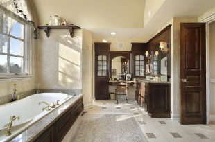 Luxury master bathroom with custom woodwork.
