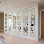 Mirrored Wardrobes with Fretwork Transitional Closet