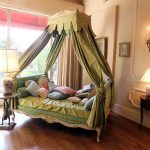 Awesome Decadent Day Bed Features A Bold Canopy And Abundant Pillows