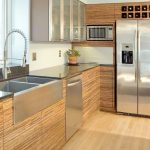Contemporary Kitchen With Bamboo Cabinets and Stainless Steel Countertops