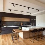 Mid-sized modern kitchen appliance - Kitchen - mid-sized modern galley  medium tone