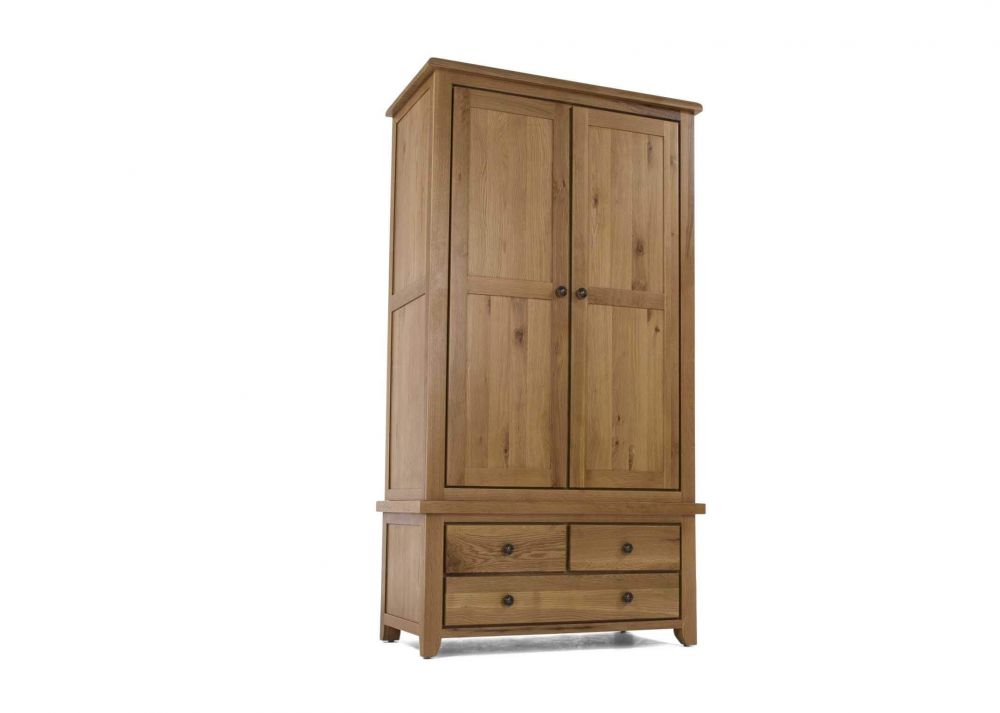 View from front side angle of the 2 door 3 drawer natural oak Cashel  wardrobe