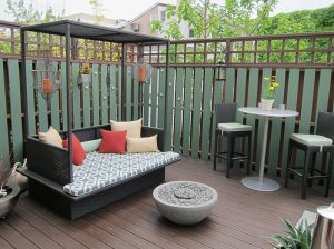 View in gallery Small outdoor bed with canopy for the compact modern deck