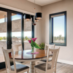 dining room with a milgard patio door leading outside