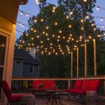 Amazing patio string lights patio lights hanging across a backyard deck  ifmkcyn