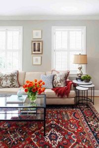 Transitional living room with oriental rug, custom textiles and nesting  tables.