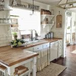 Loving all of the textures in this farmhouse kitchen