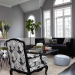 Gray Living Room With Black Sofa And Side Chairs
