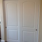 2 Panel / 2 Track Hollow Core MDF Bypass (Sliding) Closet Doors with  J-Track. Includes Brushed Silver Finger Pulls and floor guide.