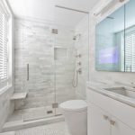 Inspiration for a small contemporary master white tile and stone tile  marble floor bathroom remodel in