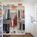 White Themed Walk in Closet with Drawers Shelving and Closet Rods