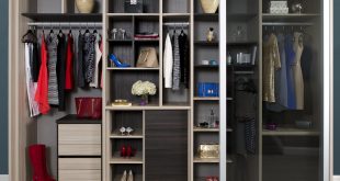 Natural Wood Stand Alone Closet with Cubbies Closet Rods Shelving Dark  Brown Accents and Sliding Glass