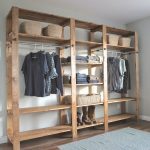 DIY wardrobes- I like how simple this is, yet can contain a  lotwith either a false wall in front of it, or curtains attached to it,  would be easy
