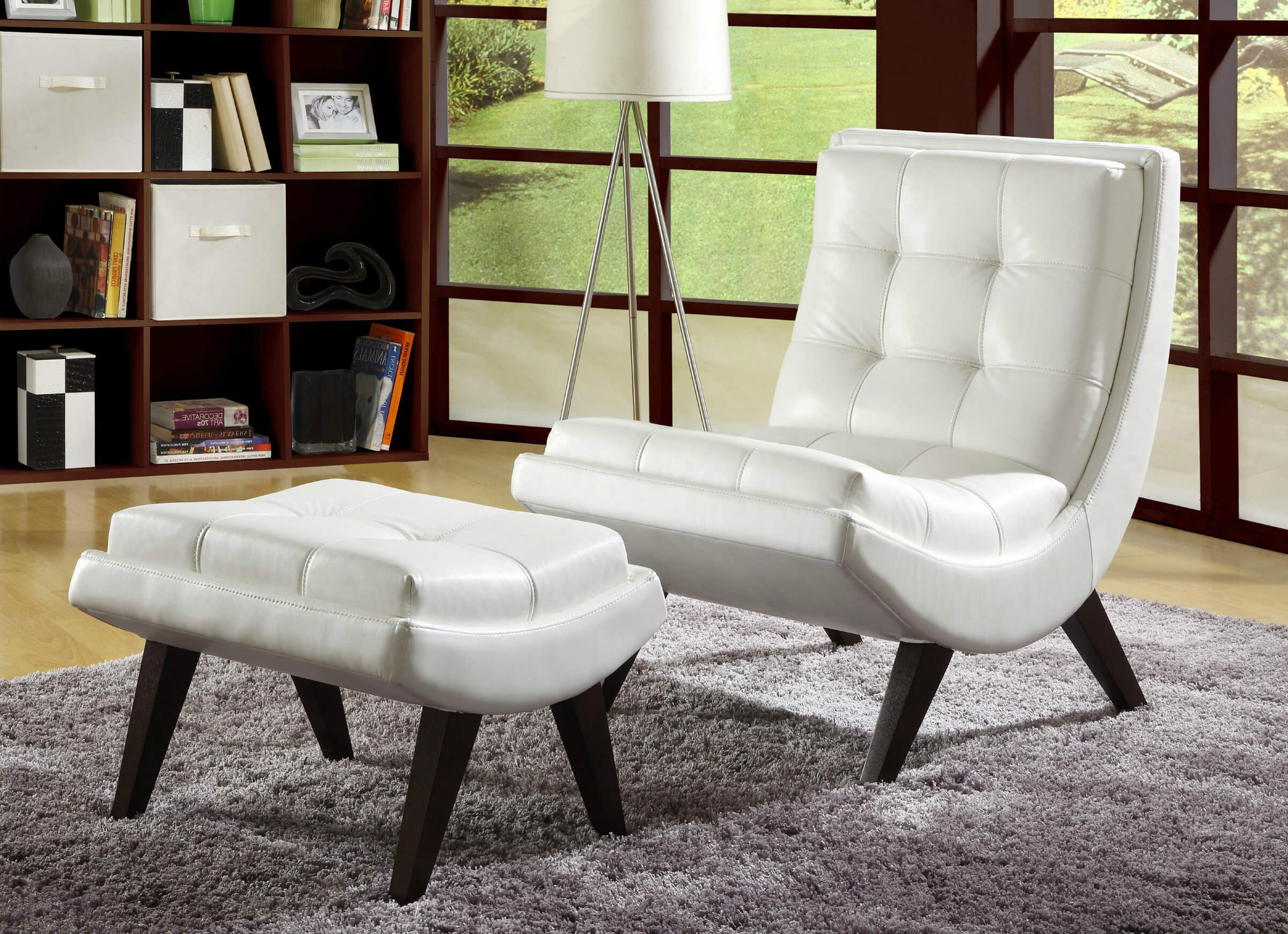 Contemporary accent chair paired with ottoman comes in white faux leather  with button tufting in curved .