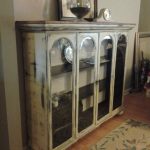 Top to a china cabinet that we repurposed. Added wood planked top, bun feet