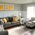 11 charcoal grey sofa and chair, yellow pillows and art pieces - DigsDigs
