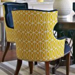 chairs upholstered in two different fabrics can have real pop!