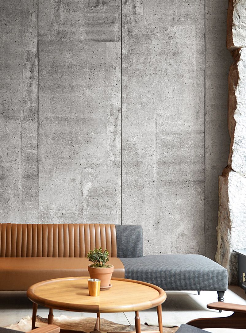 Concrete wall brings industrial chic in
  the interior